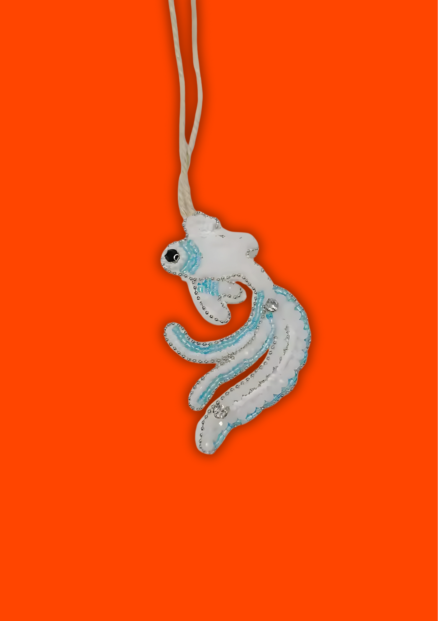 White & Blue Fish Charm